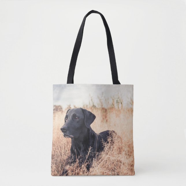 Black Labrador In Dry Grass Tote Bag (Front)