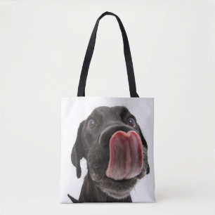 Black Labrador Licking Its Nose Tote Bag