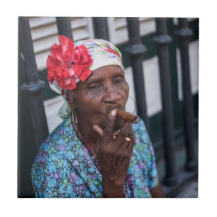 Black lady smoking a cigar with flower on head ceramic tile