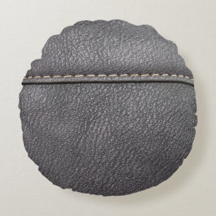 Black leather stitched with white stitching round cushion