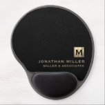 Black Luxury Gold Initial Logo Gel Mouse Pad<br><div class="desc">This modern luxury gel mouse pad is the perfect addition to any office or workspace. The sleek design features a gold initial logo in classic block typography, adding a touch of personalisation, on a black leather print background. The gel wrist rest provides comfort and support during long hours of work....</div>