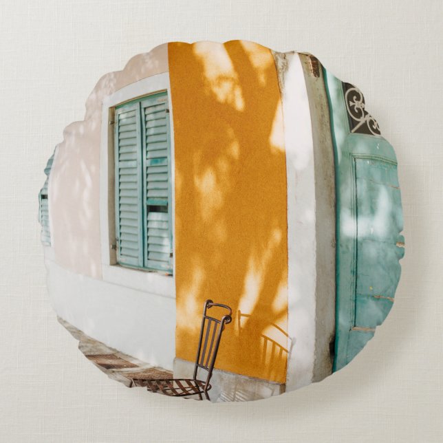 Black metal chair near dor round cushion (Front)