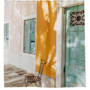 Black metal chair near dor shower curtain