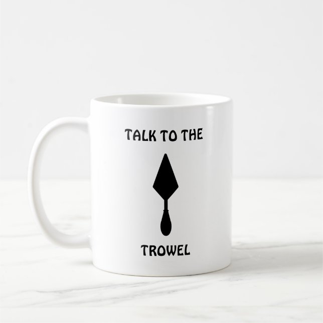 Black Minimalist Funny "Talk To The Trowel" Coffee Mug (Left)