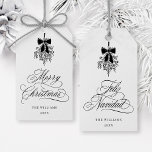 Black Mistletoe Merry Christmas | Feliz Navidad  Gift Tags<br><div class="desc">This holiday gift tag features elegant,  romantic swirly calligraphy with a winter mistletoe bouquet and a festive 'Merry Christmas' on the front,  along with 'Feliz Navidad' script on the back. For more advanced customisation of this design,  please click the BLUE DESIGN TOOL BUTTON above!</div>