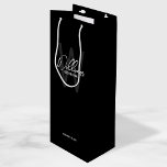 Black Modern Script Personalised Groomsman's Name  Wine Gift Bag<br><div class="desc">Modern Minimalist Personalised Monogram and Name Gifts This design features personalised groomsman's name in white modern handwriting script font style and monogram in grey modern sans serif font style as background, with wedding details in white modern sans serif font style, on black background. Also perfect for best man, maid of...</div>