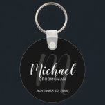Black Modern Script Personalised Groomsmen Key Ring<br><div class="desc">Add a personal touch to your wedding with personalised groomsmen keychain. This keychain features personalised groomsmen's name in white modern script font style and monogram in grey modern script font style as background with title and wedding date in white modern sans serif font style on black background. Also perfect for...</div>