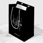 Black Modern Script Personalised Groomsmen Medium Gift Bag<br><div class="desc">Modern Minimalist Personalised Monogram and Name Gifts This design features personalised name in white modern handwriting script font style and monogram in grey modern sans serif font style as background, with wedding details in white modern sans serif font style, on black background. Also perfect for best man, maid of honour,...</div>