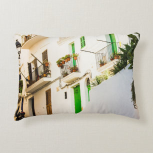 BLACK MOTORCYCLE NEAR WHITE WALL BUILDING AT DAYTI DECORATIVE CUSHION