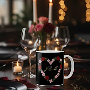 Black mug with pink and red hearts