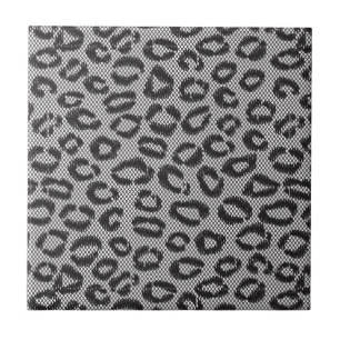 Black net lace with leopard pattern on white ceramic tile