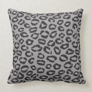Black net lace with leopard pattern on white cushion