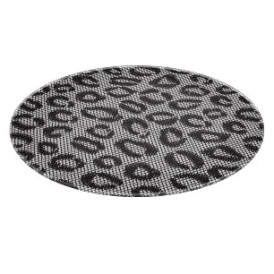 Black net lace with leopard pattern on white cutting board