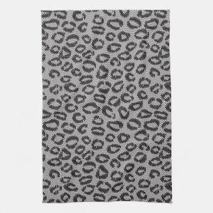 Black net lace with leopard pattern on white tea towel