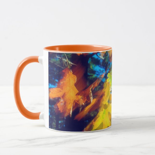 Black Oak Leaves blowing in the Wind Mug (Left)