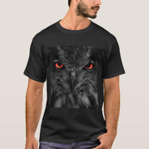 Black owl face with red eyes on men's dark tshirt