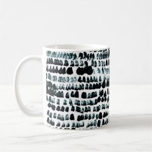 Black paint stains with spots, blots and grains on coffee mug