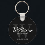 Black Personalised Script Groomsmen name&Monogram Key Ring<br><div class="desc">Add a personal touch to your wedding with personalised groomsmen keychain. This keychain features personalised groomsman's name in white classic script font style with wedding details in white classic serif font style and monogram in grey classic serif font style as background, on black background. Also perfect for best man, father...</div>