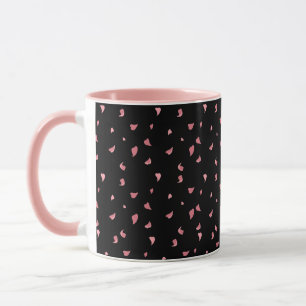 Black pink coffee mug decorated with hearts leaves