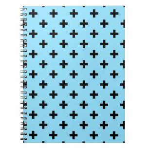 Black polka crosses on baby blue notebook
