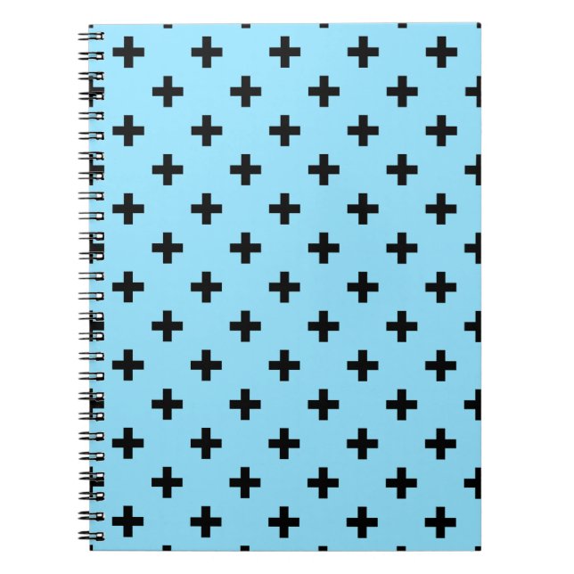 Black polka crosses on baby blue notebook (Front)