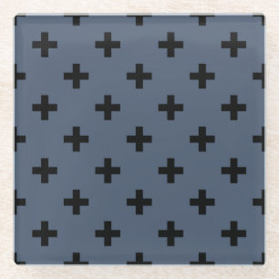 Black polka crosses on blue-grey glass coaster