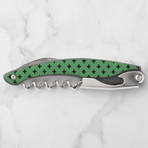Black polka crosses on green corkscrew