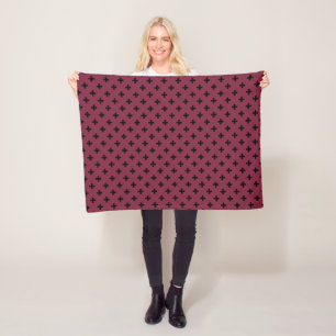 Black polka crosses on mulberry fleece blanket