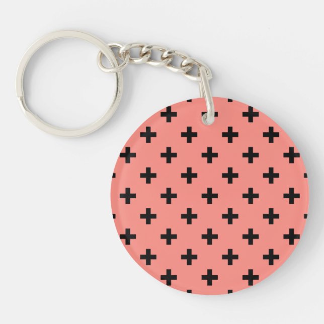 Black polka crosses on peach key ring (Front)