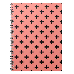 Black polka crosses on peach notebook