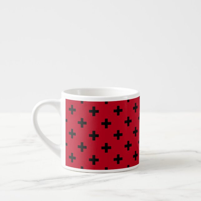 Black polka crosses on red espresso cup (Left)