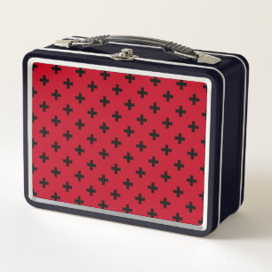 Black polka crosses on red metal lunch box
