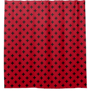 Black polka crosses on red shower curtain