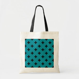 Black polka crosses on teal tote bag