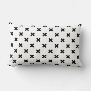 Black polka crosses on white lumbar cushion