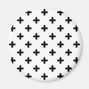 Black polka crosses on white magnet