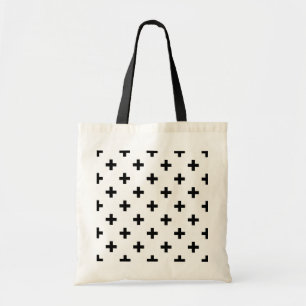 Black polka crosses on white tote bag
