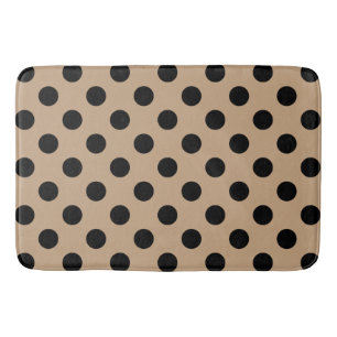 Black polka dots on beige bath mat
