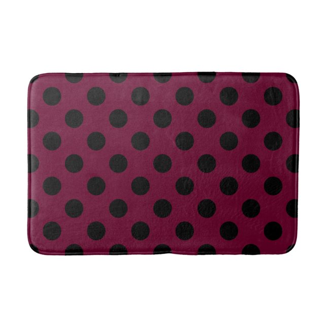 Black polka dots on burgundy bath mat (Front)