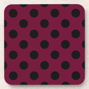 Black polka dots on burgundy coaster