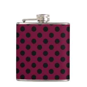 Black polka dots on burgundy hip flask