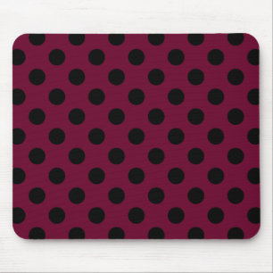 Black polka dots on burgundy mouse pad