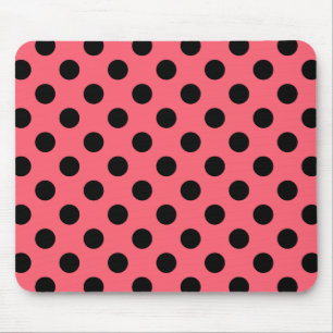 Black polka dots on coral mouse pad