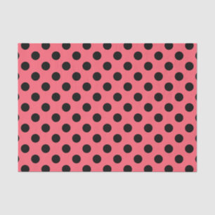 Black polka dots on coral tissue paper
