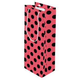 Black polka dots on coral wine gift bag