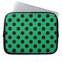 Black polka dots on fresh green