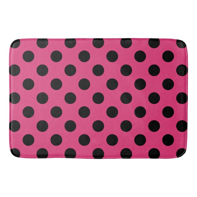 Black polka dots on fuchsia bath mat (Front)