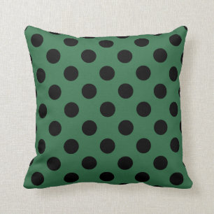Black polka dots on kelly green cushion