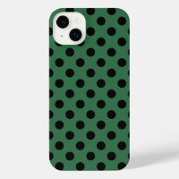 Black polka dots on kelly green