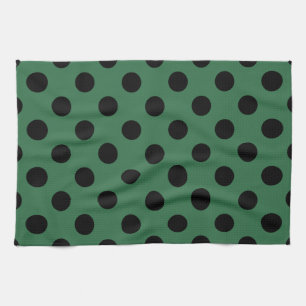 Black polka dots on kelly green tea towel